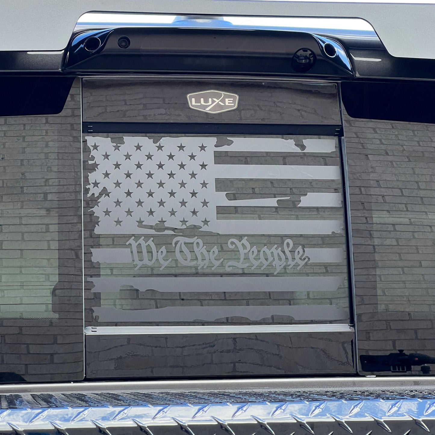 2019+ RAM Back Power Sliding Middle Window Vinyl Decal - Matte Black Distressed We The People Flag